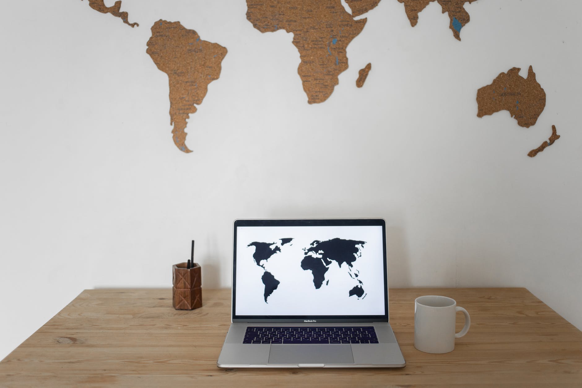 World map on wall and remote working laptop near cup and container - Global business travel

Photo by Monstera on Pexels.com